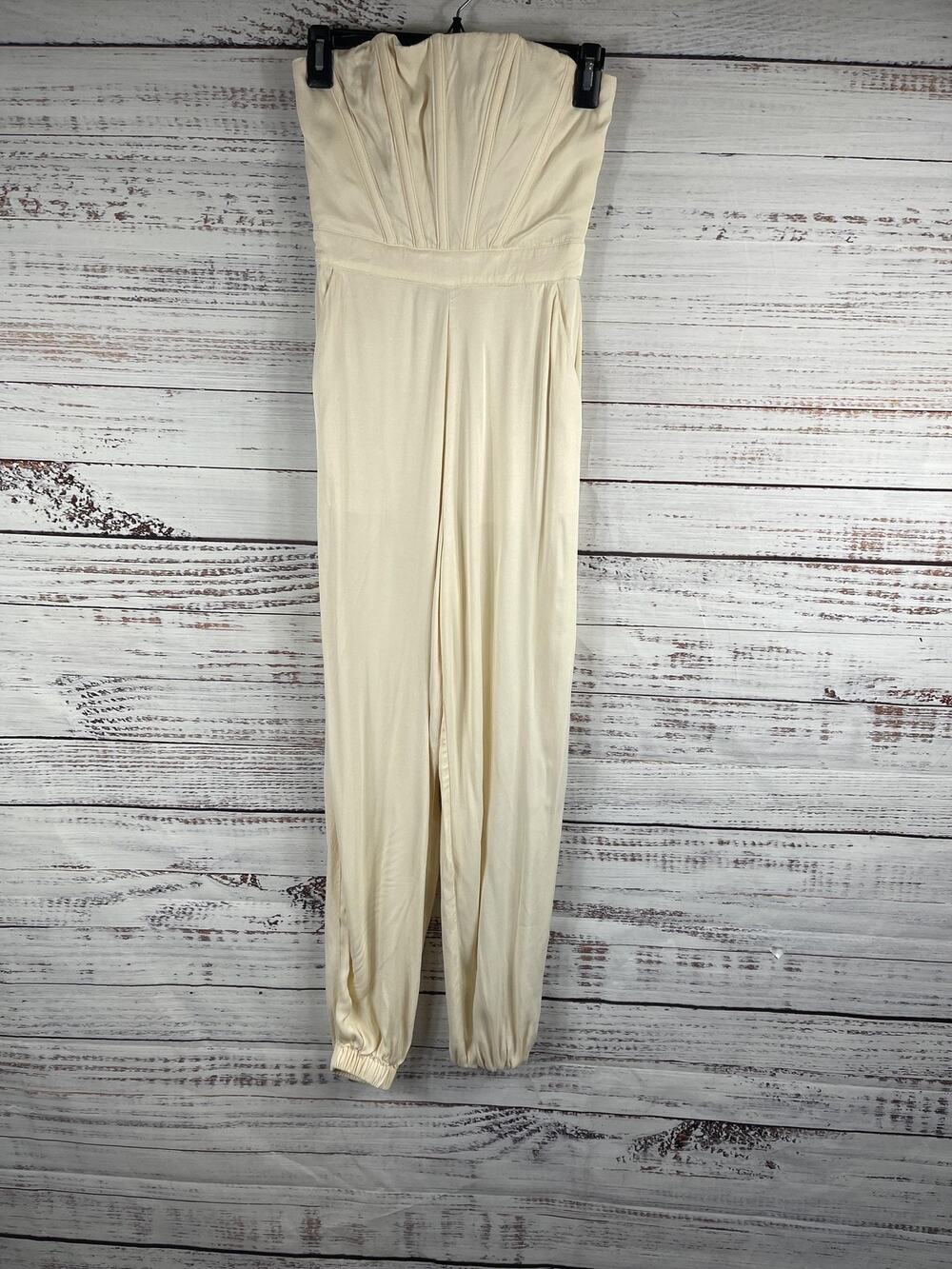 NBD Jumpsuit Women's XXS Ivory Strapless Pleated Bust Boned Bodice Elastic Cuffs